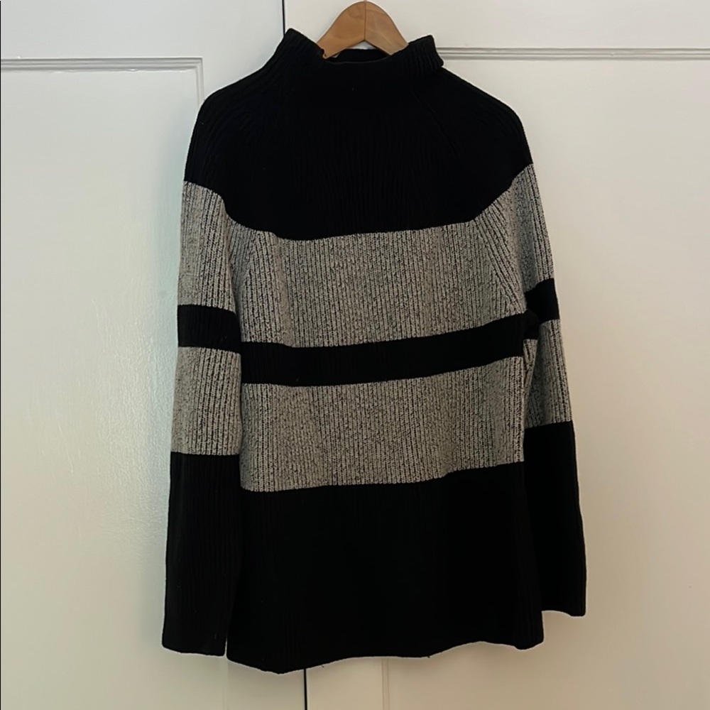 Large men’s gray and black striped sweater